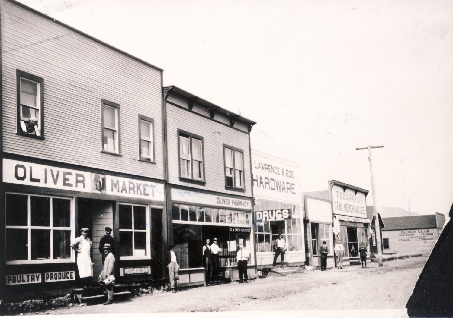 historical image of storefronts on Main St in Oliver